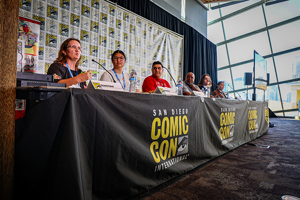 Student researchers speak on a Comic-Con panel with mentors from the Center for Comic Studies