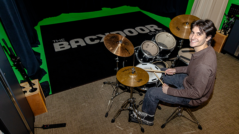 Mark Heine playing drums in the Backdoor Studio
