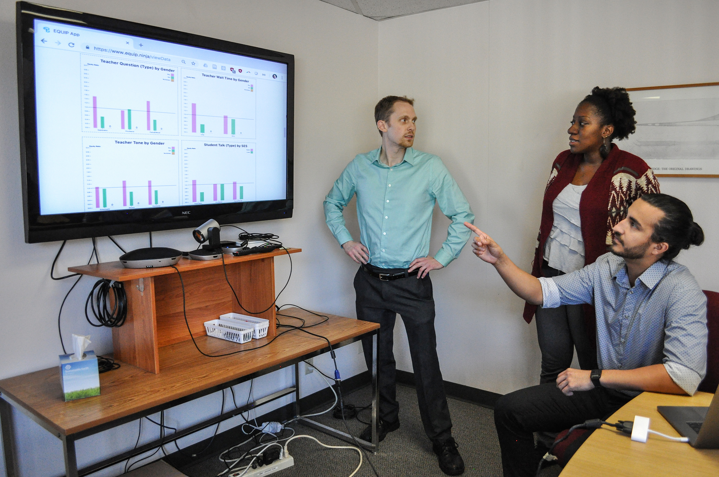 Dr. Daniel Reinholz, Amelia StoneJohnstone, and Antonio Martinez working with analytics generated by the EQUIP observation tool. Photo by Christine Luu