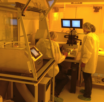two researchers in a clean room